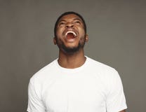 Facial expression, emotions, friendly black man laughing stock images Facial expression, emotions, friendly black man laughing stock images