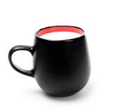 Black Mug With Milk Royalty Free Stock Images