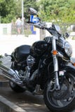 Black sport bike on city. Road Stock Photo Black sport bike on city. Road Stock Photo