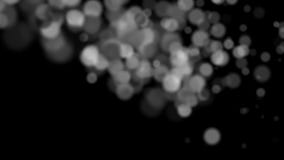 Black and white bokeh like particles stock video footage Black and white bokeh like particles stock video footage