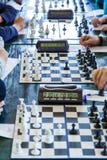 Black and white chessboard in the classroom on the table. Lesson, training, intellectual game royalty free stock images Black and white chessboard in the classroom on the table. Lesson, training, intellectual game royalty free stock images