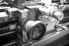 Black and white photography of flywheels slide lathe. On metalworking plant royalty free stock images Black and white photography of flywheels slide lathe. On metalworking plant royalty free stock images