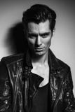 Black and white portrait of young man in leather jacket stock image Black and white portrait of young man in leather jacket stock image