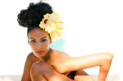 Black Woman, With Big Flowers In Her Hair Royalty Free Stock Photo