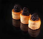 Blackberry berries in dough barrels stock photo Blackberry berries in dough barrels stock photo