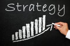 Blackboard with handwritten strategy text. Direction and success concept. Royalty Free Stock Image Blackboard with handwritten strategy text. Direction and success concept. Royalty Free Stock Image