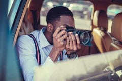Blackman strzelanina na dslr od samochodu zdjęcia stock Blackman strzelanina na dslr od samochodu zdjęcia stock