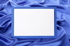 Blank Christmas Or Birthday Greetings Card Or Invitation With Blue Satin Background, Copy Space Stock Image