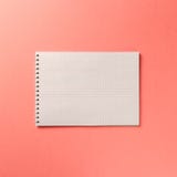 Blank notebook on Coral background royalty free stock photography Blank notebook on Coral background royalty free stock photography