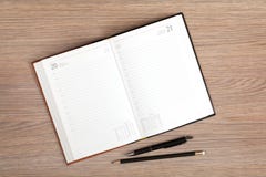 Blank notepad with pen and pencil stock photos Blank notepad with pen and pencil stock photos