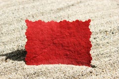 Blank Red Message Note Card in Sand Stock Photo Blank Red Message Note Card in Sand Stock Photo