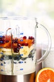 Blender with fruit and yogurt stock images Blender with fruit and yogurt stock images