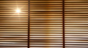 Blinds, Evening Sun Light Outside Wooden Window Blinds, Sunshine And Shadow On Window Blind. Royalty Free Stock Photos Blinds, Evening Sun Light Outside Wooden Window Blinds, Sunshine And Shadow On Window Blind. Royalty Free Stock Photos