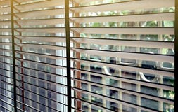 Blinds, Evening Sun Light Outside Wooden Window Blinds, Sunshine And Shadow On Window Blind. Royalty Free Stock Photos Blinds, Evening Sun Light Outside Wooden Window Blinds, Sunshine And Shadow On Window Blind. Royalty Free Stock Photos