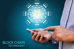 Blockchain technology concept, Businessman holding smartphone an royalty free stock photo Blockchain technology concept, Businessman holding smartphone an royalty free stock photo