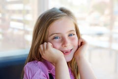 Blond relaxed happy kid girl expression blue eyes Stock Photos Blond relaxed happy kid girl expression blue eyes Stock Photos