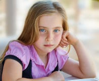 Blond relaxed sad kid girl expression blue eyes Stock Photo Blond relaxed sad kid girl expression blue eyes Stock Photo