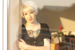 Blond Woman With Tattoo Stock Photo