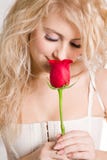Blonde with beautiful red rose Stock Photo Blonde with beautiful red rose Stock Photo