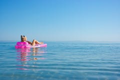 Blonde Girl On Inflatable Raft Stock Photos Blonde Girl On Inflatable Raft Stock Photos