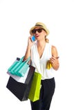Blonde shopaholic vrouwenzakken en smartphone royalty-vrije stock foto Blonde shopaholic vrouwenzakken en smartphone royalty-vrije stock foto