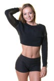 Blonde woman in black crop top and shorts. A beautiful young blonde woman in a black crop top and black shorts isolated on a white background Royalty Free Stock Photos Blonde woman in black crop top and shorts. A beautiful young blonde woman in a black crop top and black shorts isolated on a white background Royalty Free Stock Photos