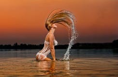 Blonde Woman In Water At Sunset Stock Photography Blonde Woman In Water At Sunset Stock Photography