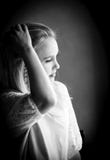 Blonde woman lost in thought in black and white monochrome Stock Photography Blonde woman lost in thought in black and white monochrome Stock Photography