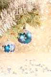 Blue christmas balls on a branch of a blue spruce Stock Photos Blue christmas balls on a branch of a blue spruce Stock Photos