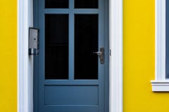 Blue Door in a yellow house royalty free stock images Blue Door in a yellow house royalty free stock images