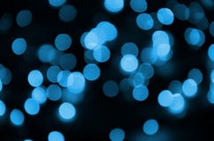 Blue Festive Christmas elegant abstract background with many bokeh lights. Defocused artistic image stock images Blue Festive Christmas elegant abstract background with many bokeh lights. Defocused artistic image stock images
