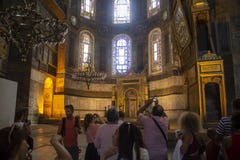 Blue Mosque, tourists take pictures of the interior.