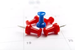 Blue pin on White Calendar Closeup shot royalty free stock images Blue pin on White Calendar Closeup shot royalty free stock images