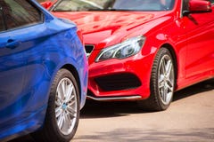 Blue and red car is in the Parking lot close-up royalty free stock photo Blue and red car is in the Parking lot close-up royalty free stock photo