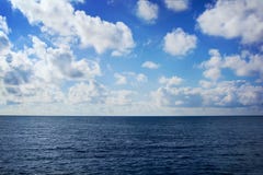 Blue Sea With Clouds Stock Photography