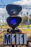 Blue semaphore near railroad stock photography Blue semaphore near railroad stock photography