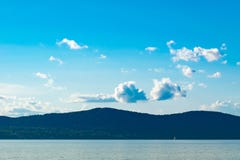 Blue Sky, rolling hills, and a small sail boat traversing the Hudson River in the distance, Sleepy Hollow, Upstate New stock photos Blue Sky, rolling hills, and a small sail boat traversing the Hudson River in the distance, Sleepy Hollow, Upstate New stock photos