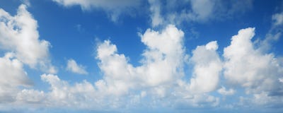 Blue sky with white clouds, panoramic background Stock Photography Blue sky with white clouds, panoramic background Stock Photography