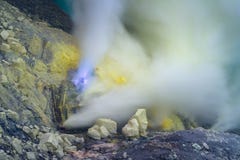 Blue sulfur flames and Sulfur fumes from the crater of Kawah Ijen Volcano in Indonesia Royalty Free Stock Images Blue sulfur flames and Sulfur fumes from the crater of Kawah Ijen Volcano in Indonesia Royalty Free Stock Images