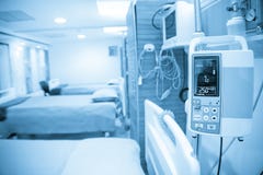 Blue tone of beds and machines in hospital.