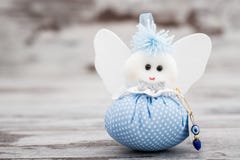 Blue Toy for Boy Prepared as a Gift for Baby Shower. On white wooden background stock photos Blue Toy for Boy Prepared as a Gift for Baby Shower. On white wooden background stock photos