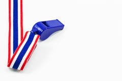 Blue wristle with red, blue and white ribbon isolated on white b stock photography Blue wristle with red, blue and white ribbon isolated on white b stock photography
