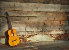 Blues guitar the old wooden wall as background stock photography Blues guitar the old wooden wall as background stock photography