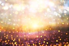 Blurred abstract photo of light burst among trees and glitter go Royalty Free Stock Photo Blurred abstract photo of light burst among trees and glitter go Royalty Free Stock Photo