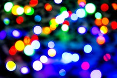 Blurred background with colorful bokeh lights on dark purple and blue background/blurred Christmas lights Royalty Free Stock Images Blurred background with colorful bokeh lights on dark purple and blue background/blurred Christmas lights Royalty Free Stock Images