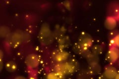 Blänker den guld- lutninggnistrandet för jul dammpartiklar på svart stock illustrationer Blänker den guld- lutninggnistrandet för jul dammpartiklar på svart stock illustrationer