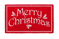 Boa vinda Mat Isolated do vermelho do Feliz Natal no fundo branco fotografia de stock royalty free Boa vinda Mat Isolated do vermelho do Feliz Natal no fundo branco fotografia de stock royalty free