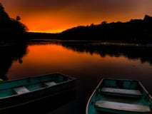 Boats on a lake at sunset royalty free stock image Boats on a lake at sunset royalty free stock image