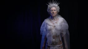 Body art of the Snow Queen with icicle crown and earrings