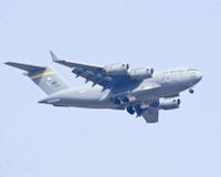 The Boeing C-17 Globemaster III military aircraft flying at Aero India Show 2013. Stock Photos The Boeing C-17 Globemaster III military aircraft flying at Aero India Show 2013. Stock Photos